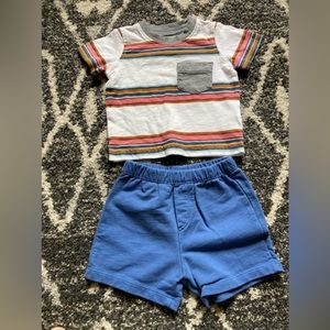Striped boy’s tee and blue shorts